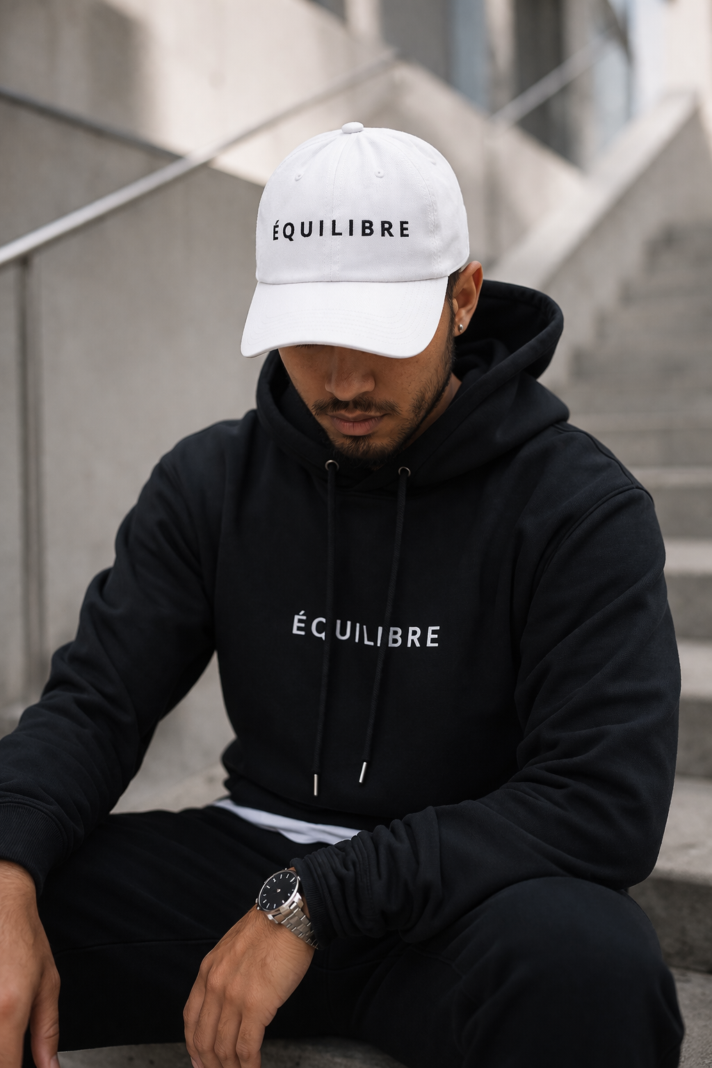 Close up of  ÉQUILIBRE Signature Cap fabric stitching premium finish adjustable strap