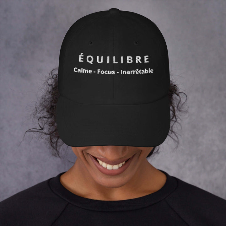 Black ÉQUILIBRE Calm Focus Unstoppable Cap worn casually stylish streetwear look
