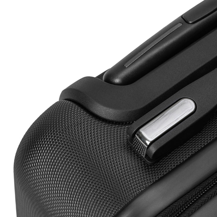 ÉQUILIBRE Suitcase Travel with Mastery black wheels and handle close up durable smooth travel mobility